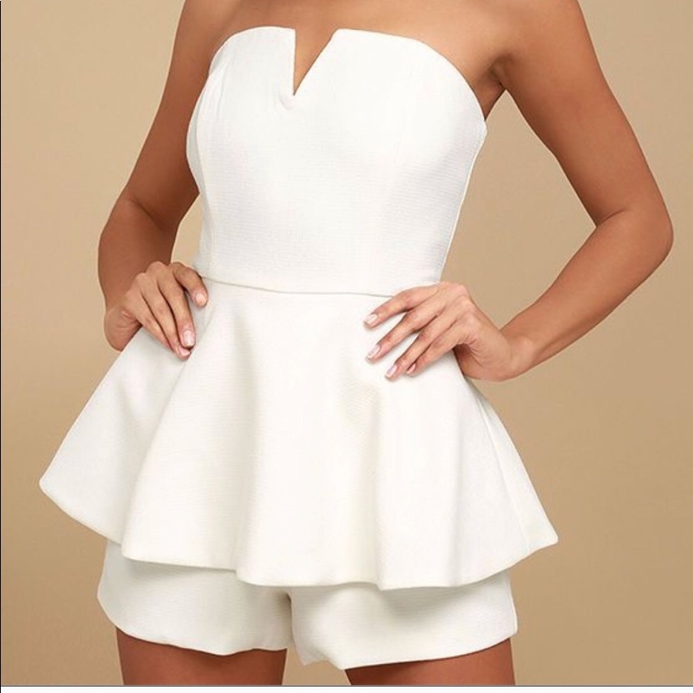 NWT white romper with flattering skirt